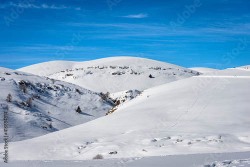 Snowy landscape in winter on the Lessinia Plateau (Altopiano della Lessinia), Regional Natural Park, near Malga Gaibana and Malga San Giorgio, ski resort in Verona province, Veneto, Italy, Europe.