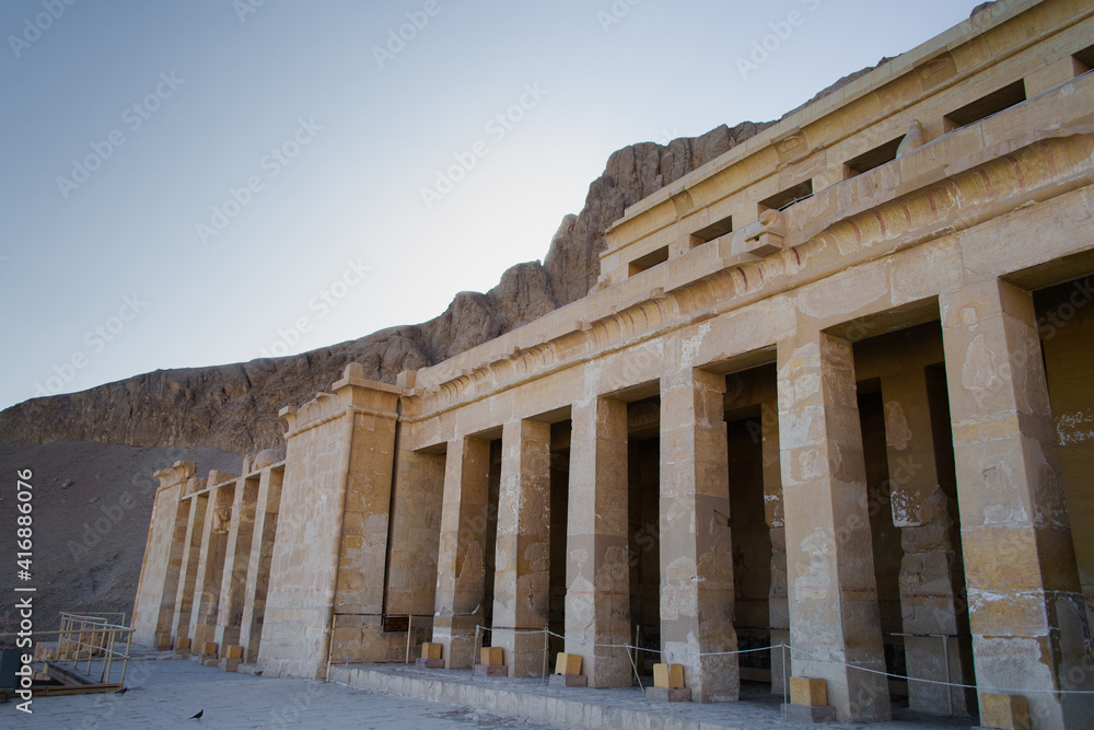 View of the rocky temple of Hatshepsut. Location of old city Luxor, complex Deir el-Bahari, Egypt, Africa. Popular touristic place. Ancient Egyptian civilization. Discover the beauty of earth.