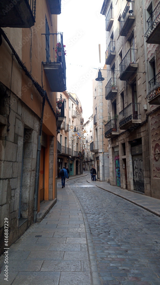 European street in the old town. Pedestrian street in Girona