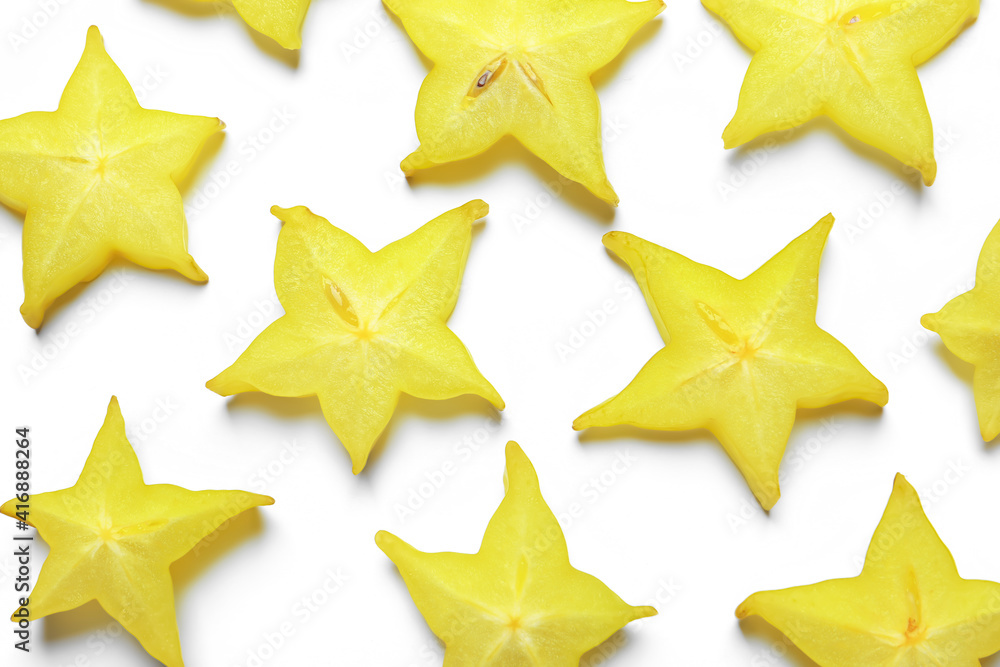 Slices of delicious carambola on white background, top view Slices of delicious carambola on white background, top view