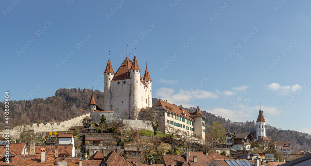 Thun city skyline with panoramic view of medieval castle and church on sunny day a swiss travel destination in switzerland bern.
