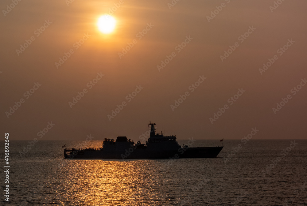 Sri Lanka Navy ship at anchor at sunset off the coast at Colombo