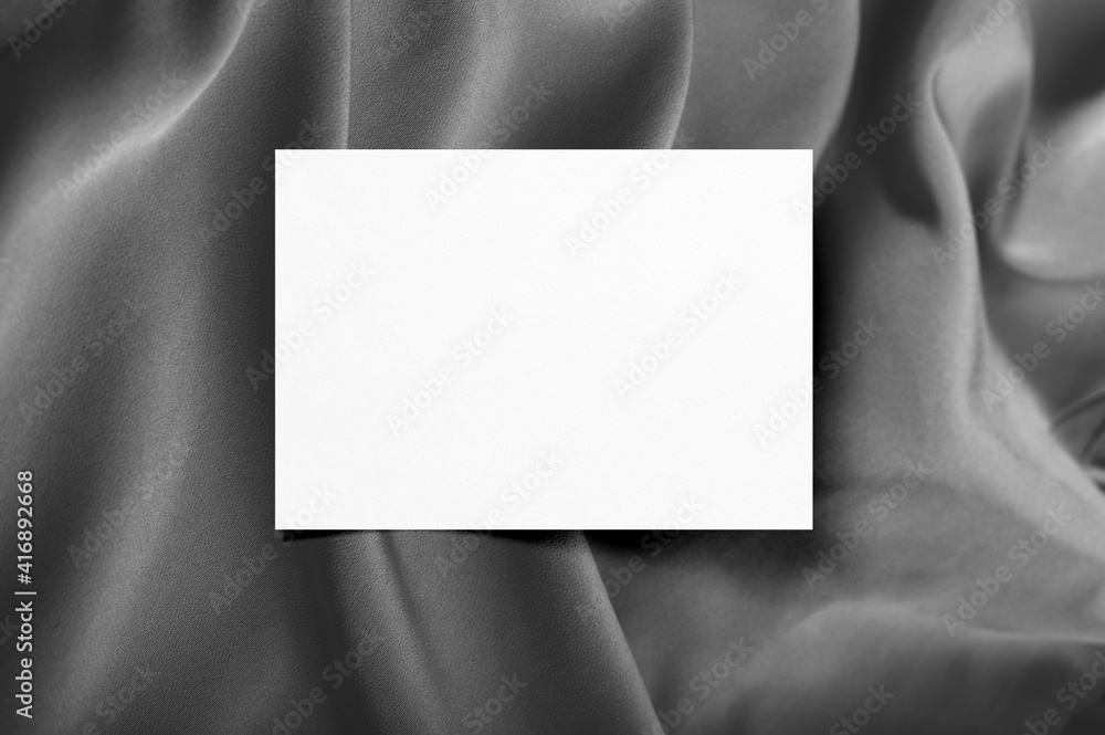 blank white a4 poster or flyer mockup on the silk fabric blank white a4 poster or flyer mockup on the silk fabric