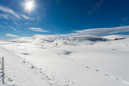 Lessinia High Plateau (Altopiano della Lessinia) and the Tomb Mountain (Monte Tomba) in winter with snow, Regional Natural Park, Malga San Giorgio ski resort in Verona province, Veneto, Italy, Europe.