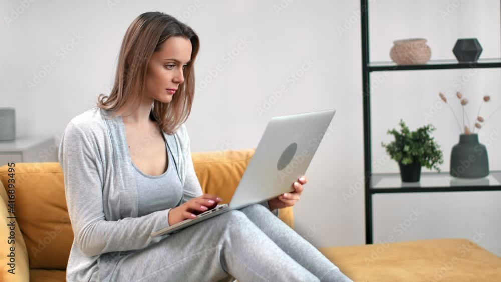 Confident freelance woman work remote typing on keyboard use laptop pc. Shot with RED camera in 4K Confident freelance woman work remote typing on keyboard use laptop pc. Shot with RED camera in 4K