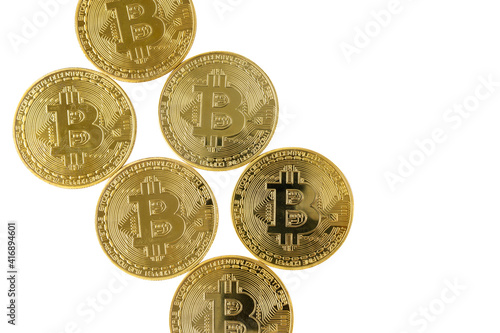 Golden bitcoin isolated on white background.