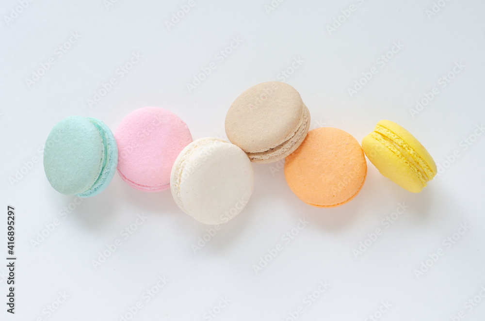 Top view of sweet pastel macaron on white background Top view of sweet pastel macaron on white background