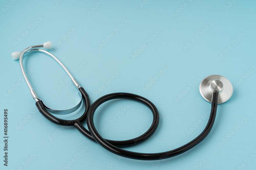 Stethoscope on blue background with a copy space. Medical concept. Stethoscope on blue background with a copy space. Medical concept.