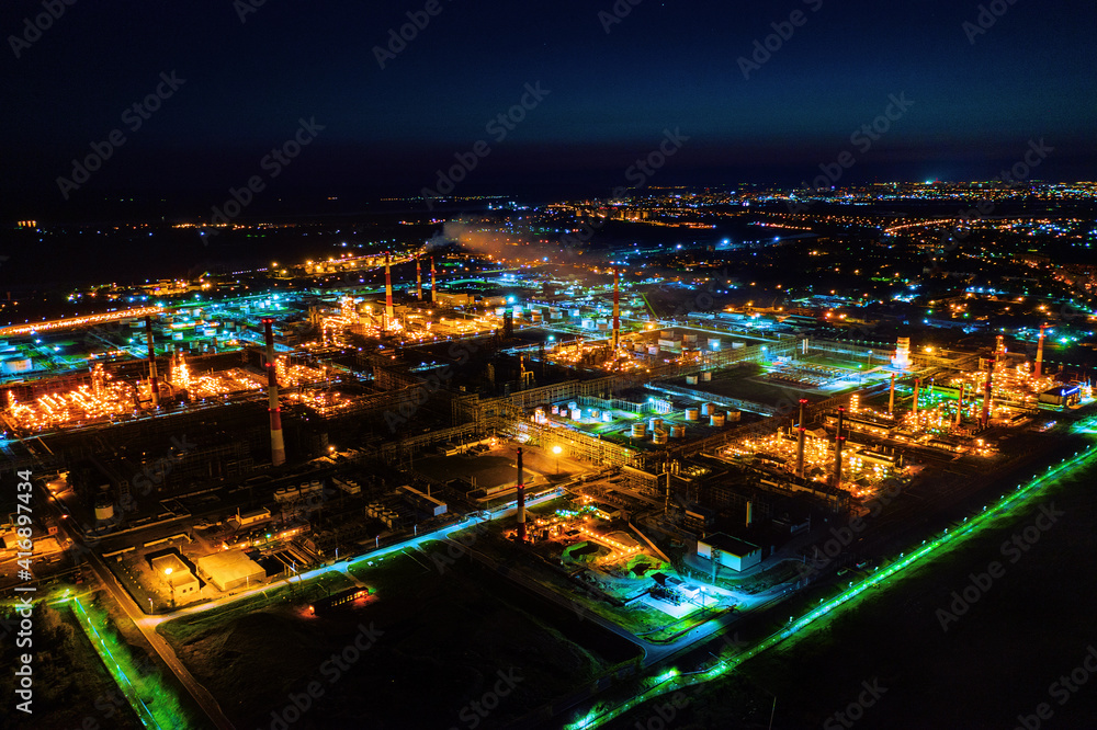 Naklejka premium Oil refinery night