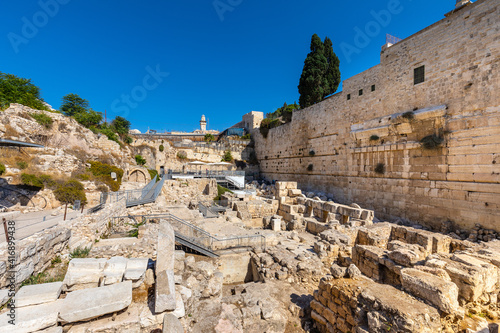 Western side of Temple Mount walls with Robinson's Arch and Western Wall excavation in Jerusalem Old City in Israel