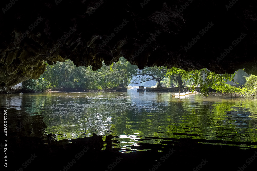 View from inside a cave of the Ngo Dong River at the Tam Coc portion, Ninh Binh Province, Vietnam.