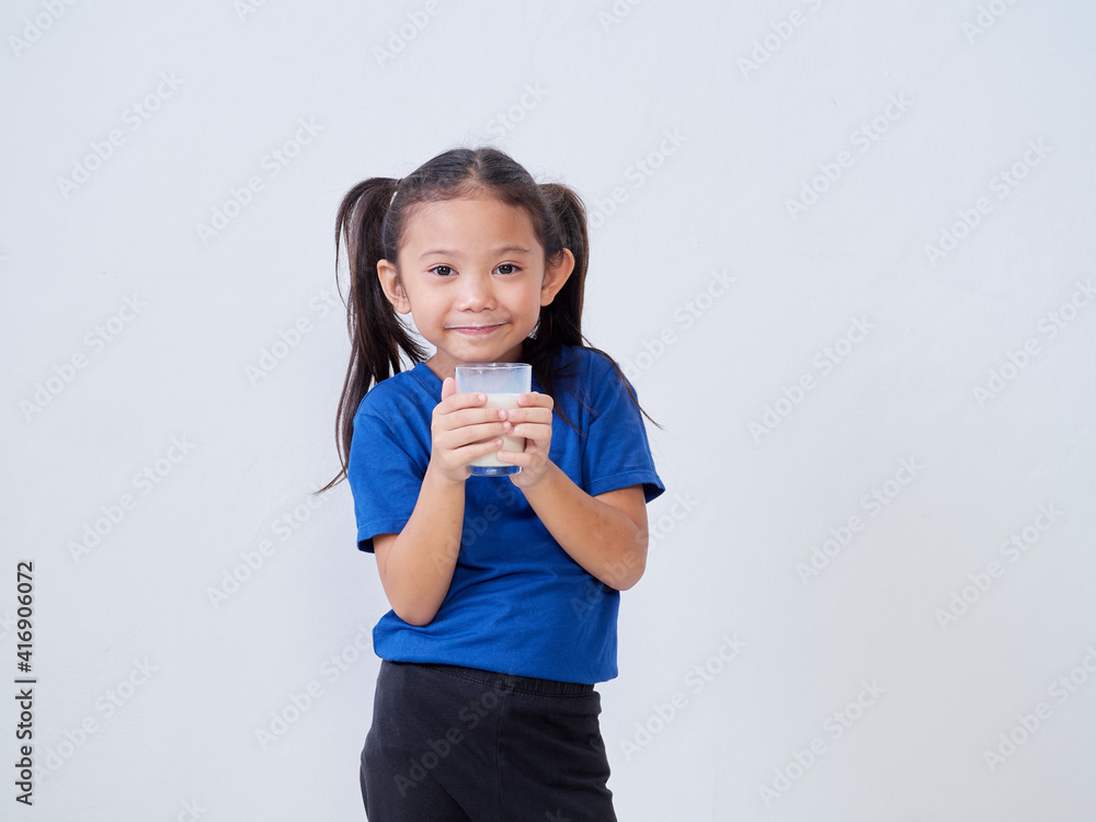 Cute little girl drinking milk Cute little girl drinking milk