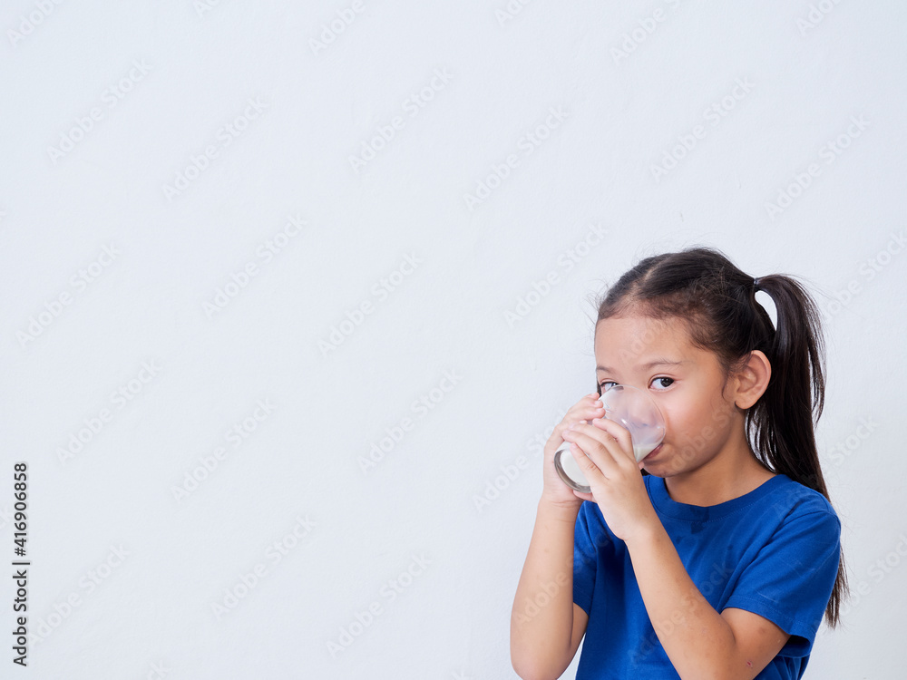 Cute little girl drinking milk Cute little girl drinking milk