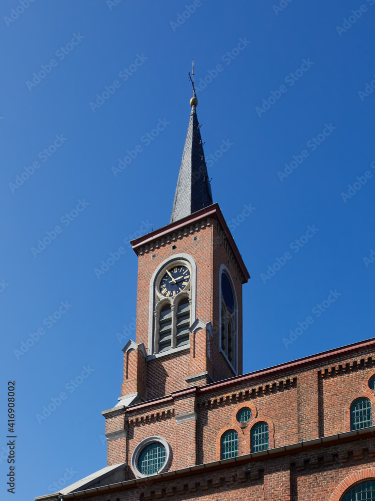 Tower of a country church in Flanders Belgium