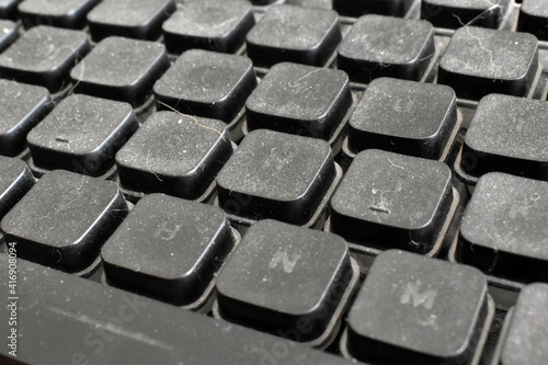 Dirty computer keyboard background.