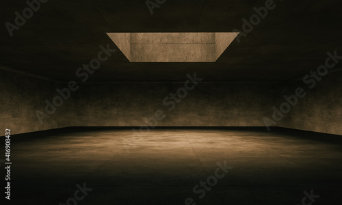 large concrete room illuminated by an upper window and by the edges of the floor