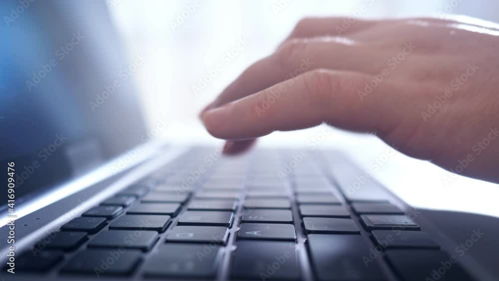 Close-up of hands of woman typing on laptop zoom in Close-up of hands of woman typing on laptop zoom in