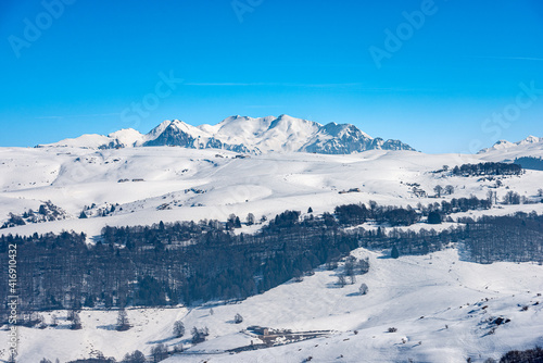 Lessinia High Plateau (Altopiano della Lessinia) and the Mountain range of the Monte Carega in winter with snow, also called the small Dolomites. Veneto and Trentino Alto Adige, Italy, Europe.