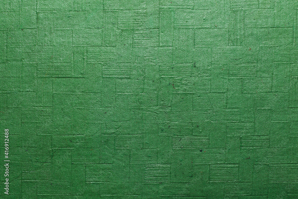A beautiful green color handmade paper of gingham texture with veins and fibers. Useful for background, 3d rendering. A beautiful green color handmade paper of gingham texture with veins and fibers. Useful for background, 3d rendering.