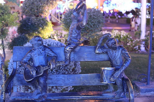beautiful bronze sculptures at night
