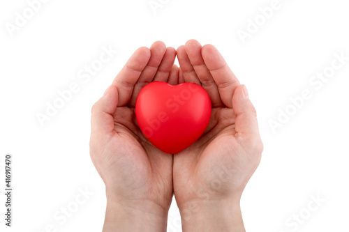 Red heart in hands isolated on white background with clipping path. Health insurance or love concept