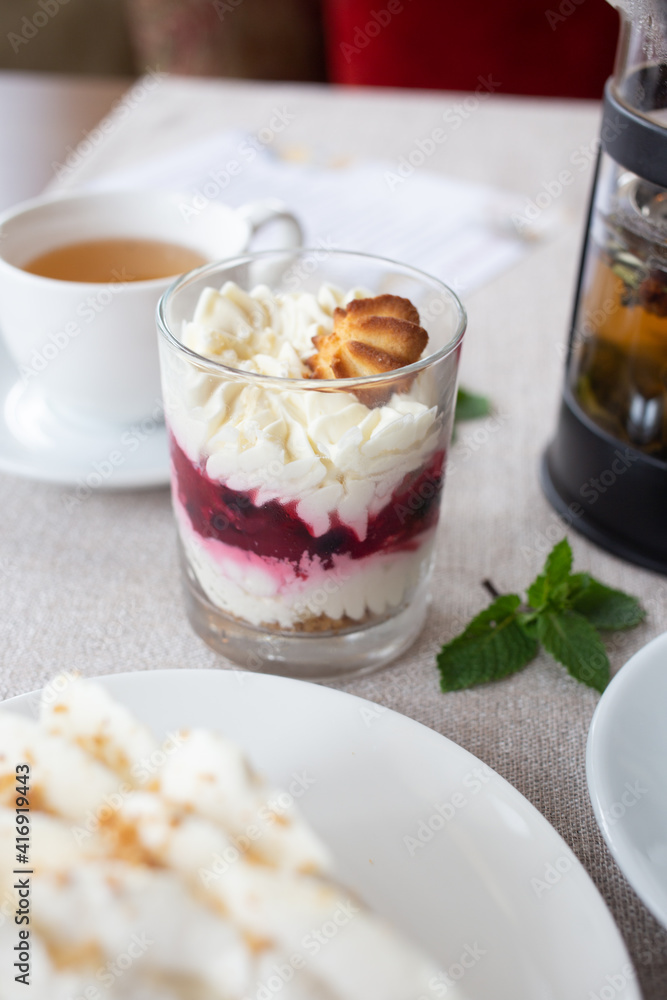 Dessert in a glass with cream and cookies Dessert in a glass with cream and cookies