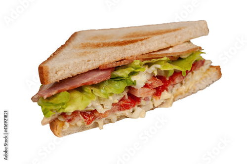 toasted sandwich with ham, cheese and vegetables, isolated