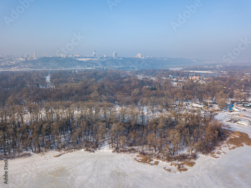 View of Kiev in early spring. Aerial drone view. Sunny morning.