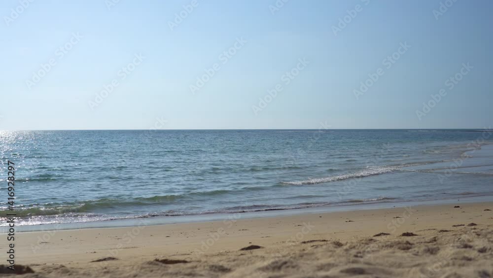 4K video of Summer beach relaxation with bokeh sun light and blue sky. 4K video of Summer beach relaxation with bokeh sun light and blue sky.