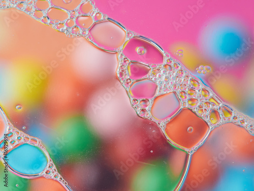 Background of colorful oil drops in water