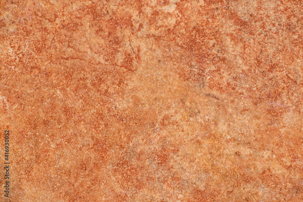 Red-brown surface with light marbling like stone Red-brown surface with light marbling like stone