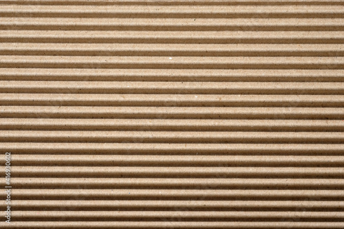 Corrugated board close up background. Cardboard packing material texture. Cardboard for use as packaging.