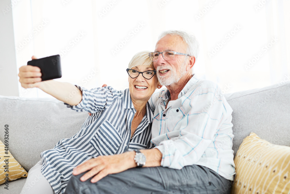 senior couple taking selfie happy elderly retired portrait mobile phone smartphone technology love photo