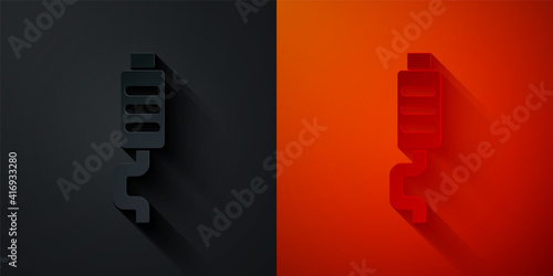 Paper cut Car muffler icon isolated on black and red background. Exhaust pipe. Paper art style. Vector.