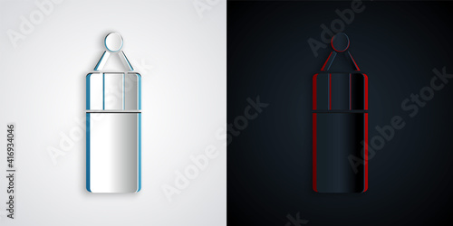 Paper cut Punching bag icon isolated on grey and black background. Paper art style. Vector.