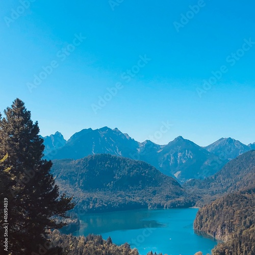 A beautiful lake surrounded by mountains and trees 