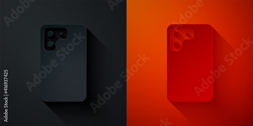 Paper cut Smartphone, mobile phone icon isolated on black and red background. Paper art style. Vector.