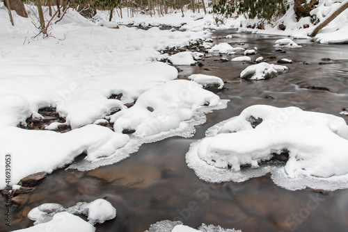 The gentle cascade continues in the cold and in the snow