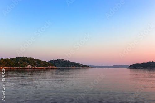 Rocky islets off the entrance to Mali Lago on the north-west corner of Lastovo, Dubrovnik-Neretva, Croatia: early morning light © Will Perrett