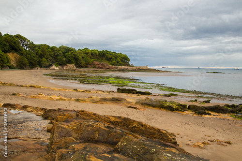 Kirkcaldy Sandy Beach, part of shore below Ravenscraig Castle with Signature Sandstone at Front and Washed out Green Alga	
 photo