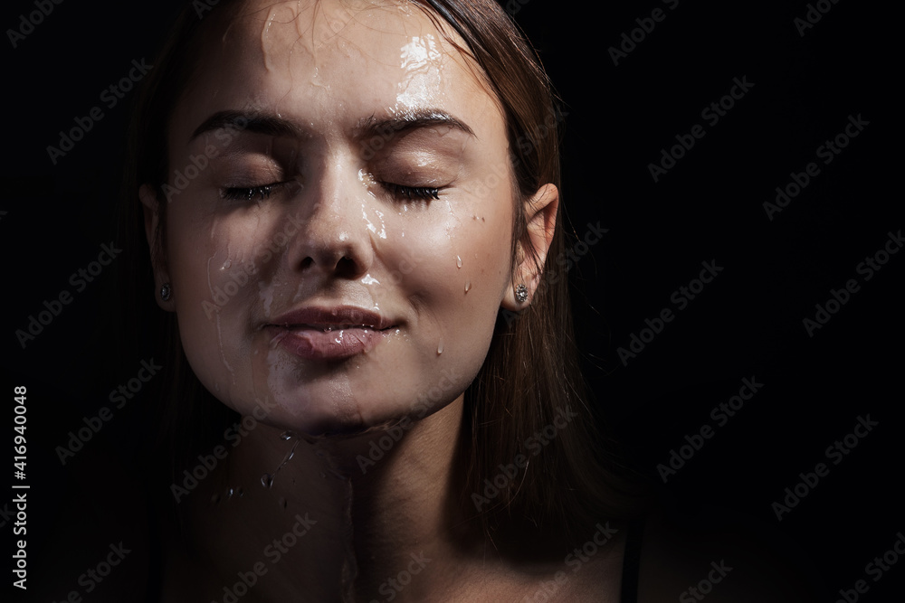 Water runs down my face. Portrait of a young beautiful woman Water runs down my face. Portrait of a young beautiful woman
