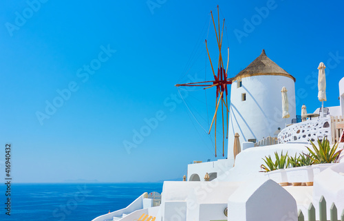 Windmill by the sea in Santorini in Greece