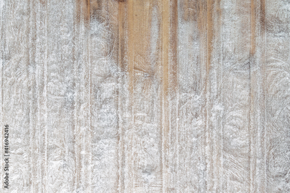 winter frosty background: boards covered with snowflakes and hoarfrost, ice patterns, wood texture, close, toning winter frosty background: boards covered with snowflakes and hoarfrost, ice patterns, wood texture, close, toning