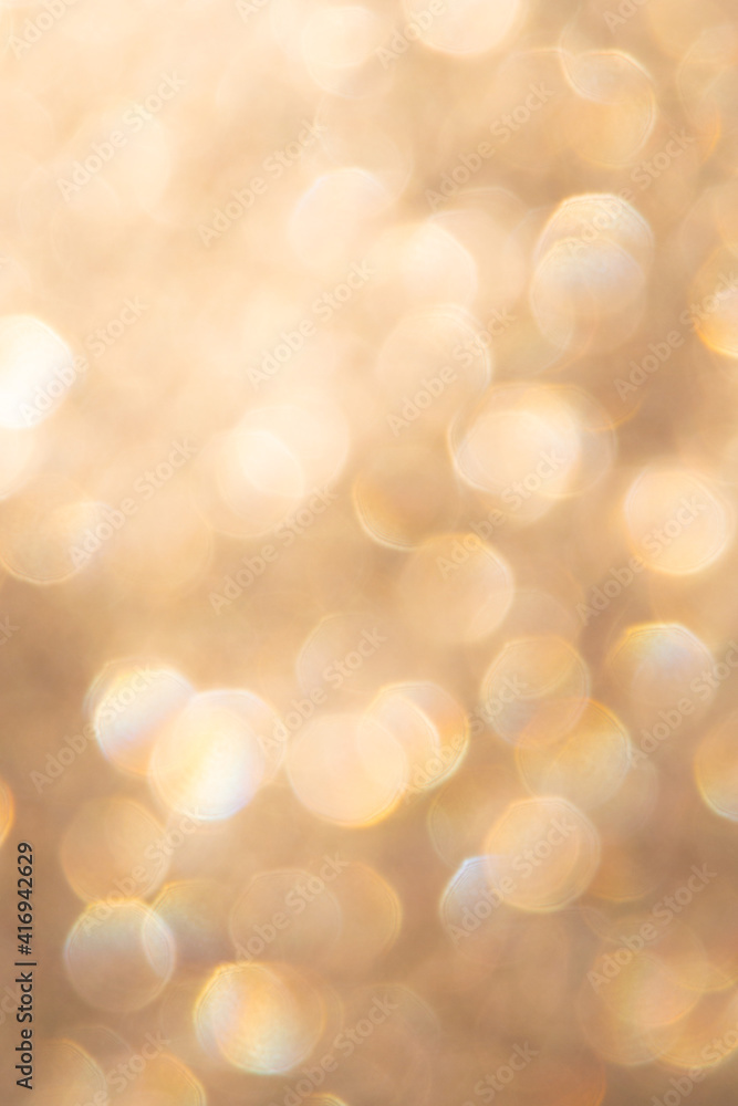 bright glitter background: bokeh effect from many colored lights on frozen glass, toning bright glitter background: bokeh effect from many colored lights on frozen glass, toning