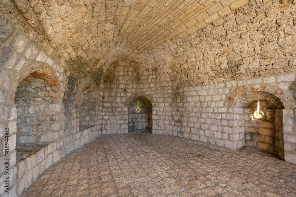 Obraz premium Stone bunker inside fortress of Wall of Ston on hill in city of Ston in Ragusa in Croatia summer