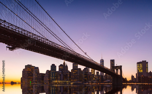 Fototapeta Naklejka Na Ścianę i Meble -  New York City Panoramic landscape view of Manhattan with famous Brooklyn Bridge at sunset.
