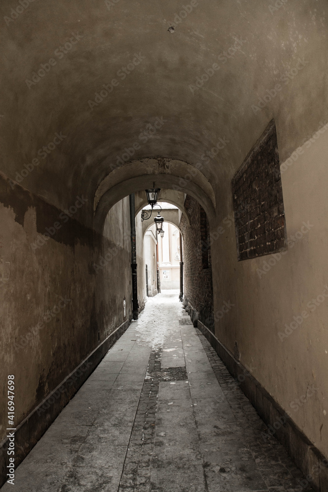 An alley - historic architecture of the old town of Warsaw, Poland