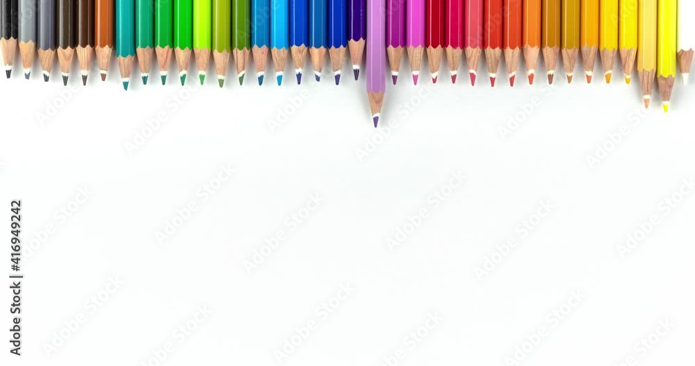 animated frame with colored wooden pencils on a white background, copy space. stop motion seamless looping footage animated frame with colored wooden pencils on a white background, copy space. stop motion seamless looping footage