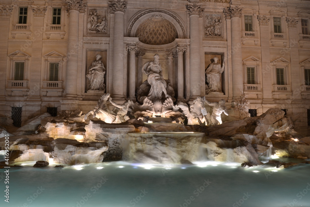 trevi fountain at night in Rome detail