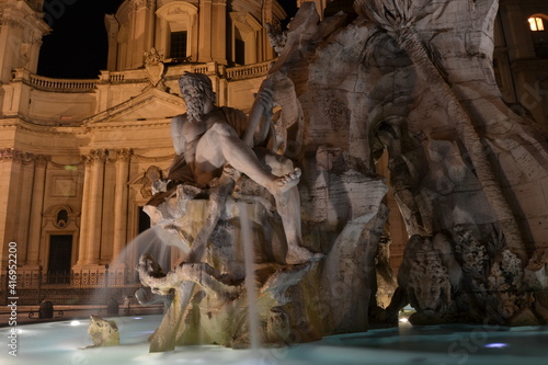 Detail of fountain in piazza navona Rome Italy at night close up 